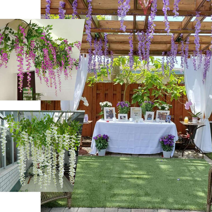 Wisteria flowers decorating an outdoor event space with greenery and tables.