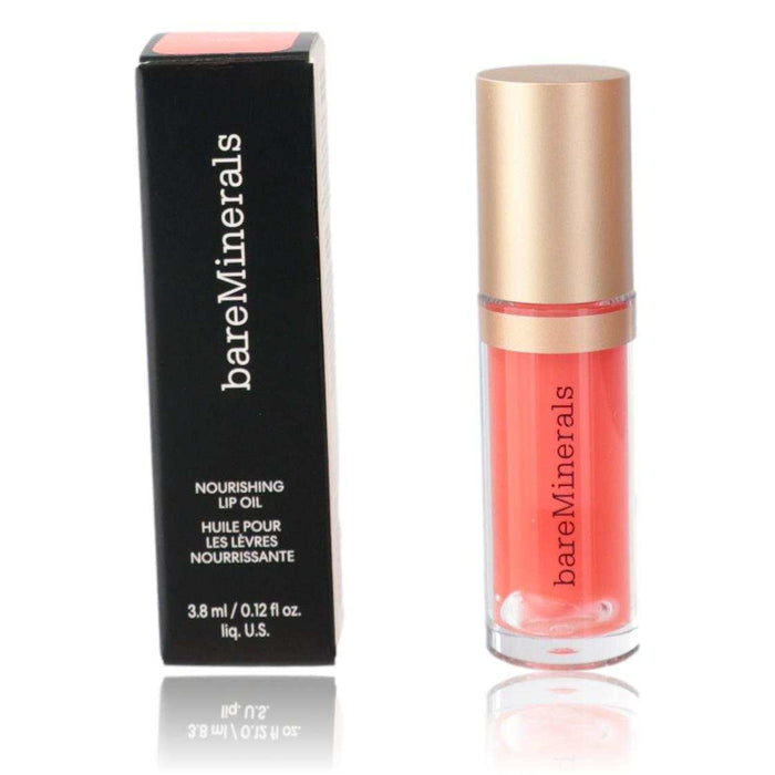 bareMinerals Nourishing Lip Oil in coral-pink Charm, with a clear tube, gold-toned cap, and black product box