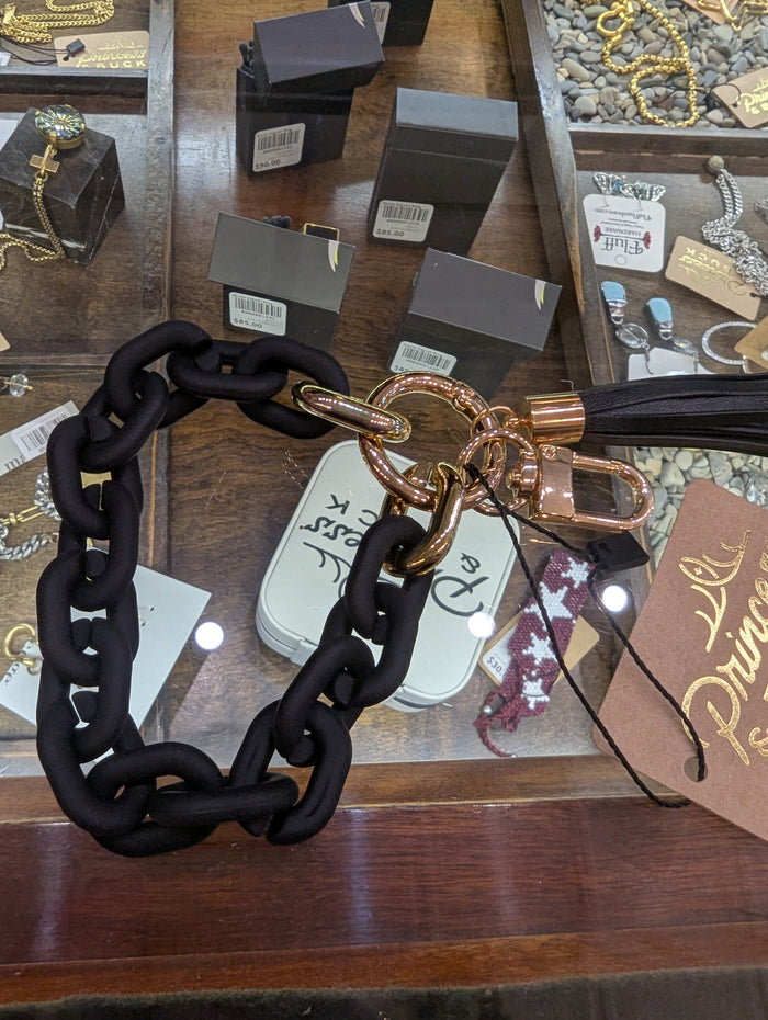 Chainlink keychain with tassel by A Sparkling Mess, featuring a metal chain and decorative tassel for stylish accessory use.