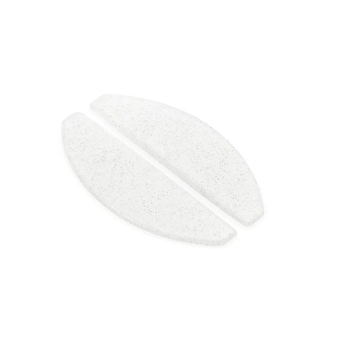 pair of clear glitter korean flat lash lifting shields on a white background