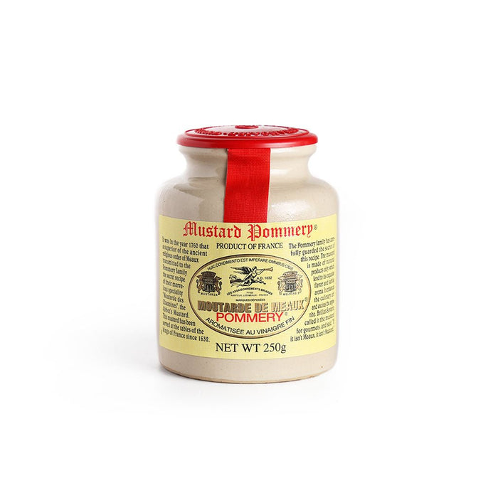 Stone jar of Pommery Mustard with red lid and yellow label.