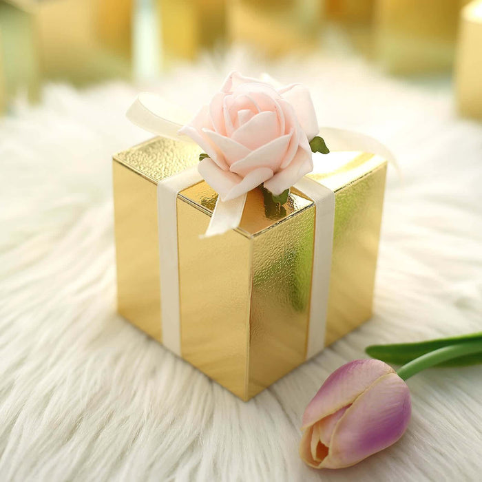 Gold gift box with a pink rose on top, surrounded by soft fur and tulip.