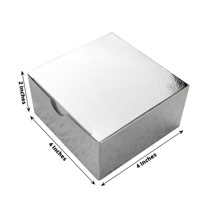 Silver gift box, 4x4 inches, 2 inches high, reflective surface.
