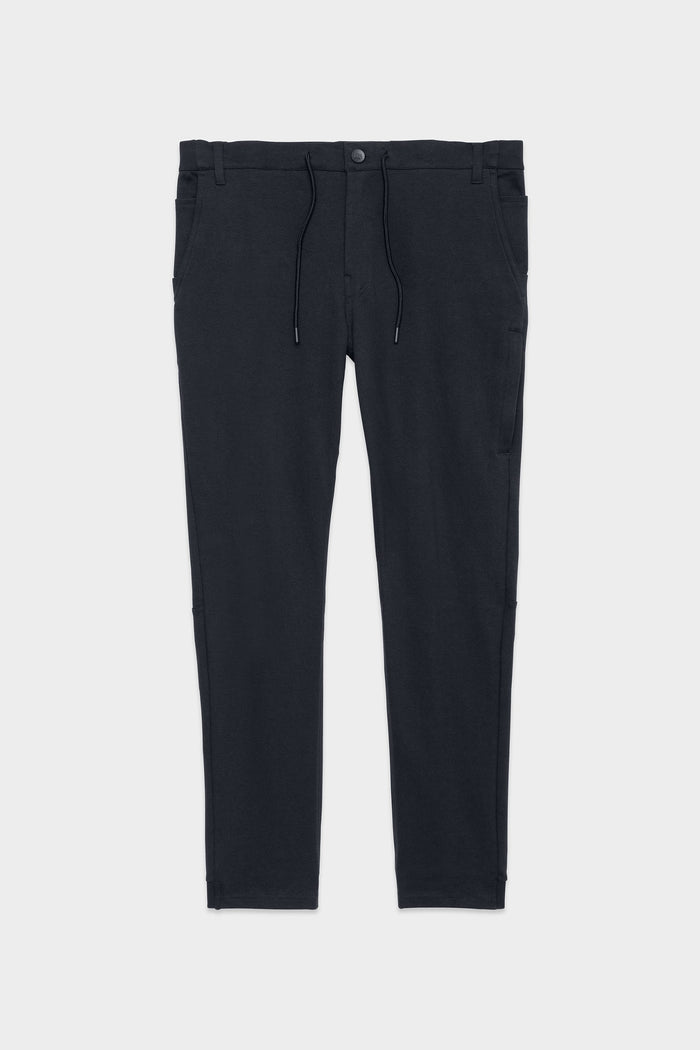 The 686 Mens Everywhere Double Knit Pant by 686, shown in black with a slim fit, drawstring waist, belt loops, and side pockets, is displayed flat on a light gray background.