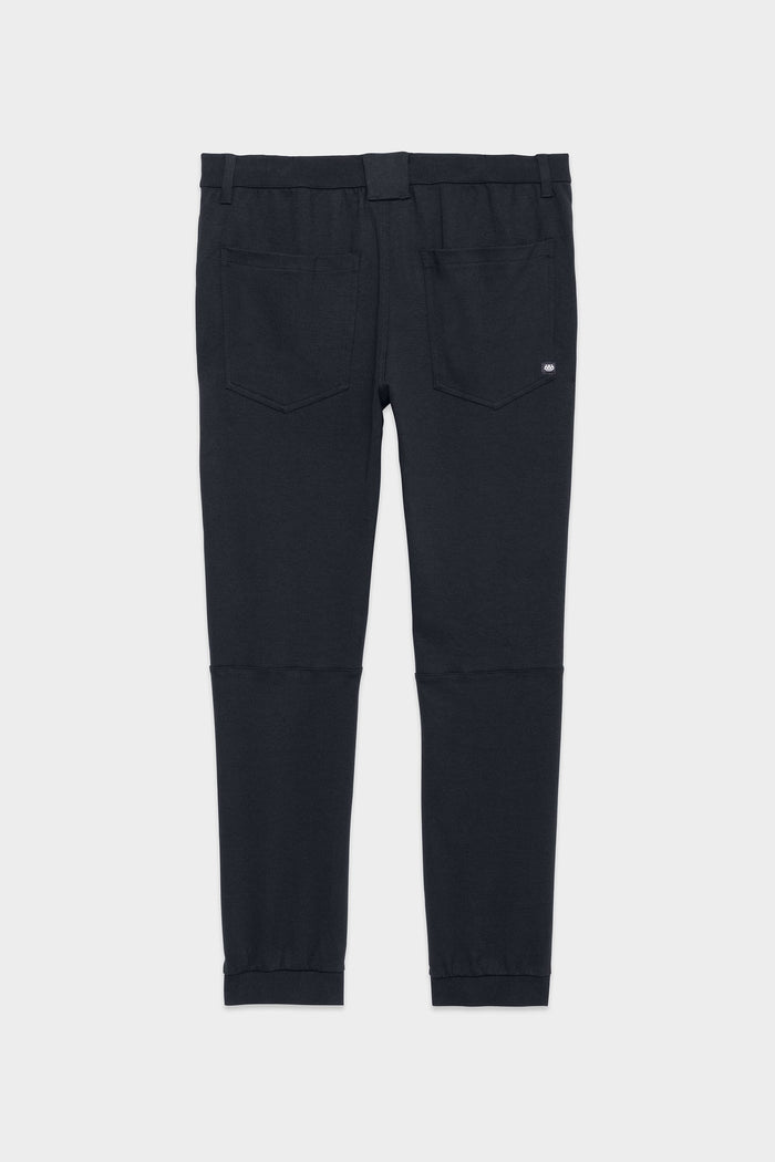 686 Mens Everywhere Double Knit Pant by 686 shown from the back, with two back pockets, belt loop waistband, and elastic ankle cuffs, displayed against a plain light background.