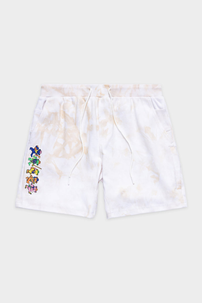 The 686 Mens Everywhere Double Knit Short by 686 features a white tie-dye design, drawstring waist, side pockets, and colorful cartoon character graphics running vertically down the left leg.