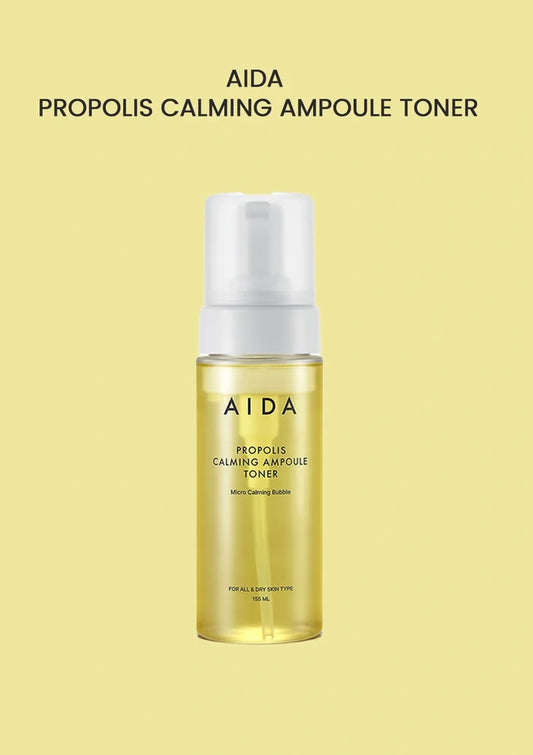 AIDA Propolis Calming Ampoule Toner bottle on a yellow background