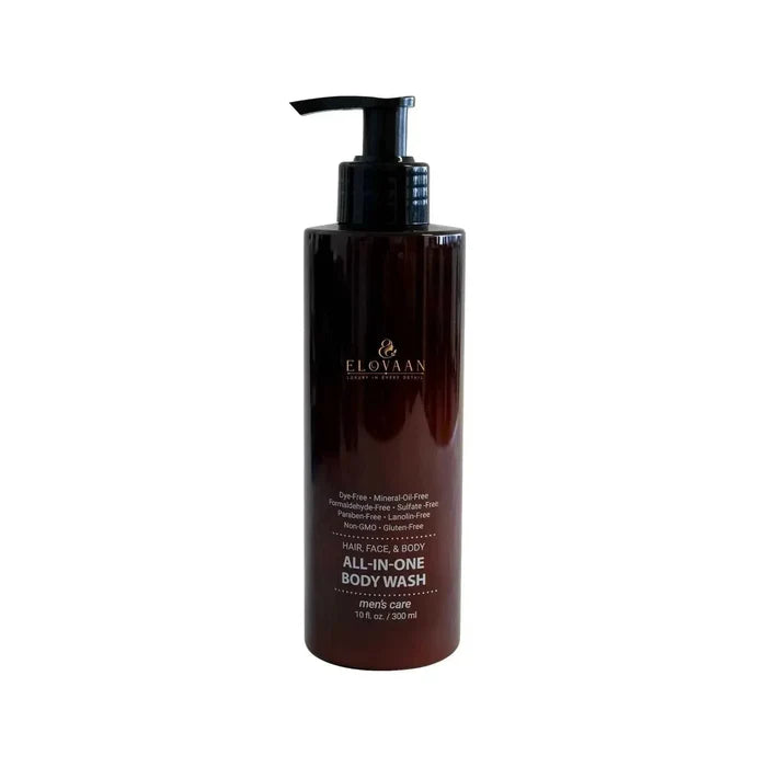 Body wash in a dark amber pump bottle with a black dispenser and gold lettering, labeled all-in-one body wash; zazzee usda organic milk thistle