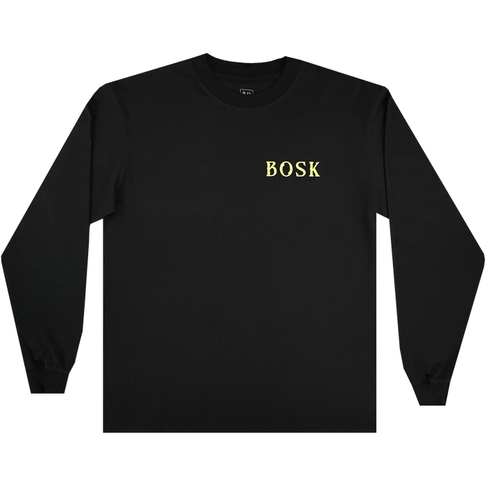 An Allure LS Tee by Other is laid flat on a white background. Made from heavy-weight cotton, this black long-sleeve t-shirt features the word “BOSK” printed in yellow capital letters on the left chest. Its classic fit and minimal design ensure no additional graphics or patterns are visible.