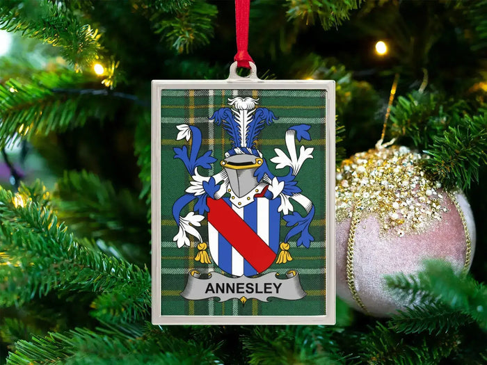 Annesley Irish family crest Christmas ornament — crest on the Irish national tartan in a silver-tone frame