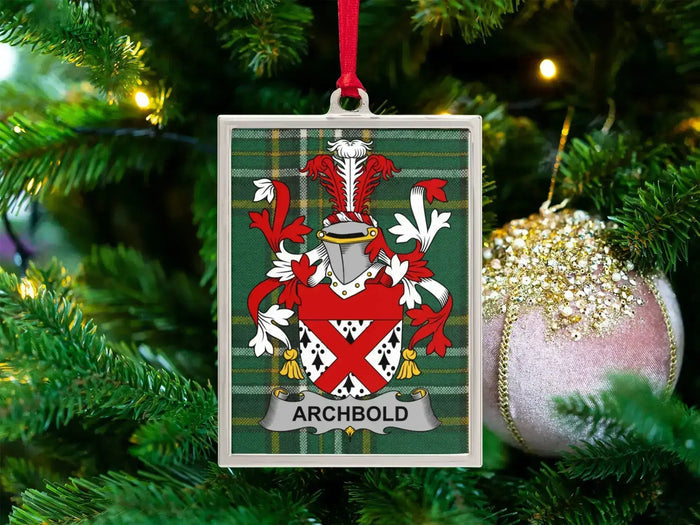 Archbold Irish family crest Christmas ornament — crest on the Irish national tartan in a silver-tone frame