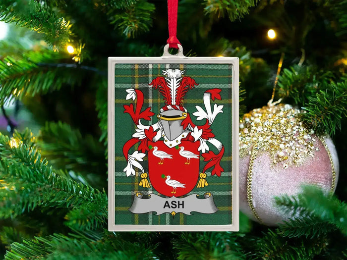 Ash Irish family crest Christmas ornament — crest on the Irish national tartan in a silver-tone frame