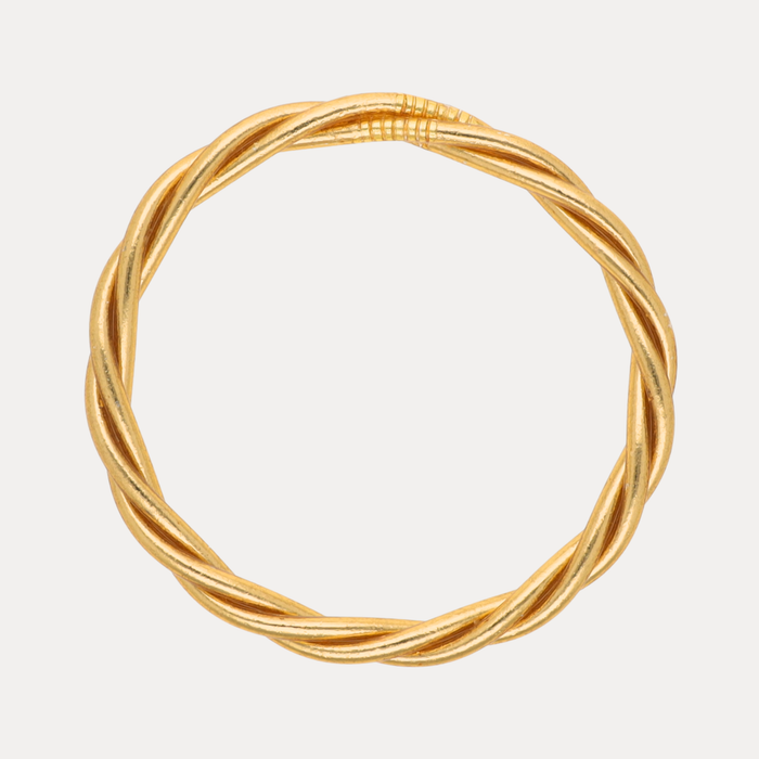 a gold ring with a knot
