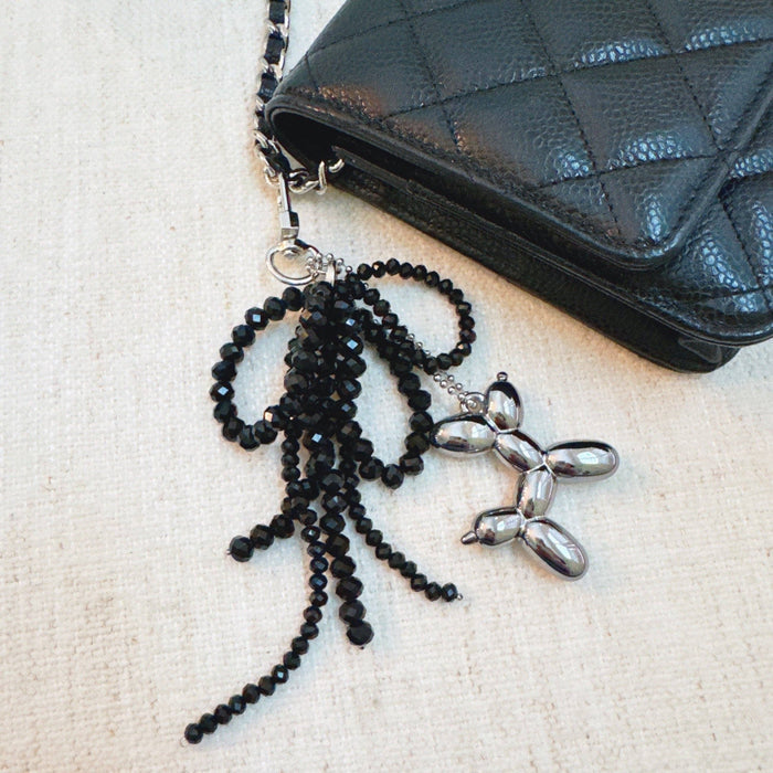Ellison+Young Balloon Dog Bag Charm with beaded bow, colorful decorative accessory for handbags