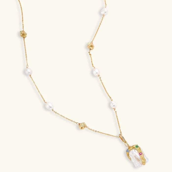 Baroque Bloom Freshwater Pearl necklace with an irregular white pearl pendant, gold-tone chain, pearl accents and colorful stones