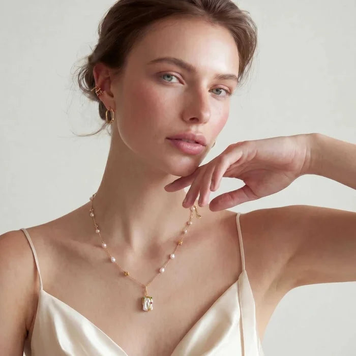 Baroque Bloom Freshwater Pearl necklace with delicate gold-tone chain, scattered pearls and a colorful baroque pendant