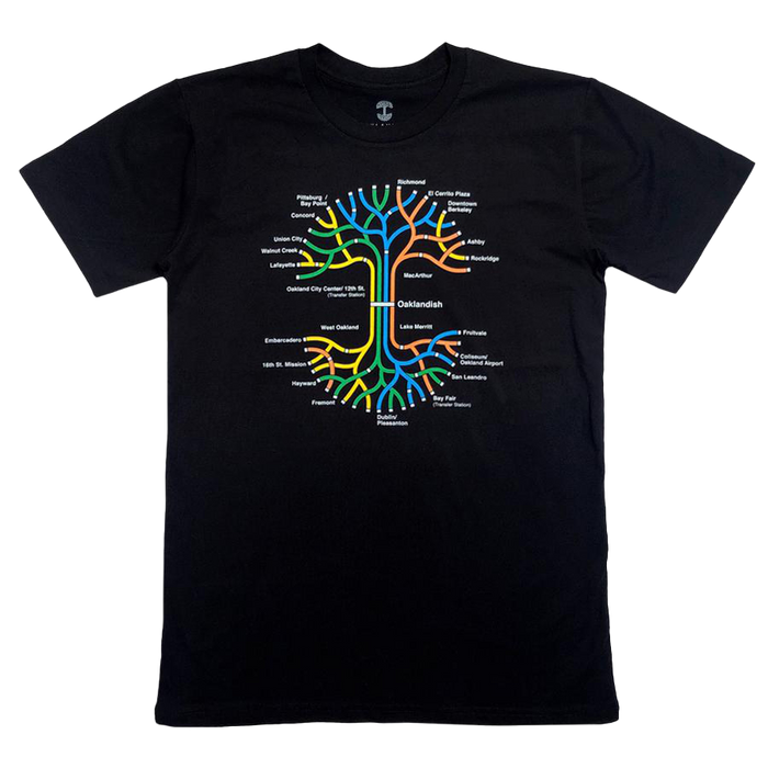 The BART Tree Tee by Oaklandish is a classic fit t-shirt made from 100% cotton, featuring a tree-inspired graphic with multicolored branches that resemble a BART map. Each branch is adorned with station names like "Metro Center" and "Hunter's Point" in white text, while the trunk prominently displays "Oaklandish" in white.