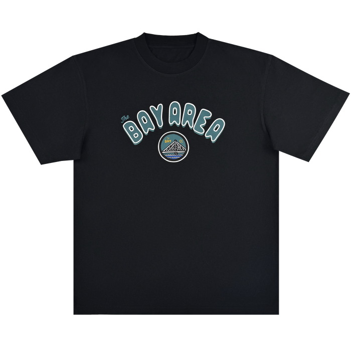 The Bay Area CC Tee by DOC from Oaklandish is a black short-sleeve classic fit, heavyweight cotton t-shirt featuring “The BAY AREA” in white and teal and a circular graphic of a mountain, bridge, sun, sky, and water.