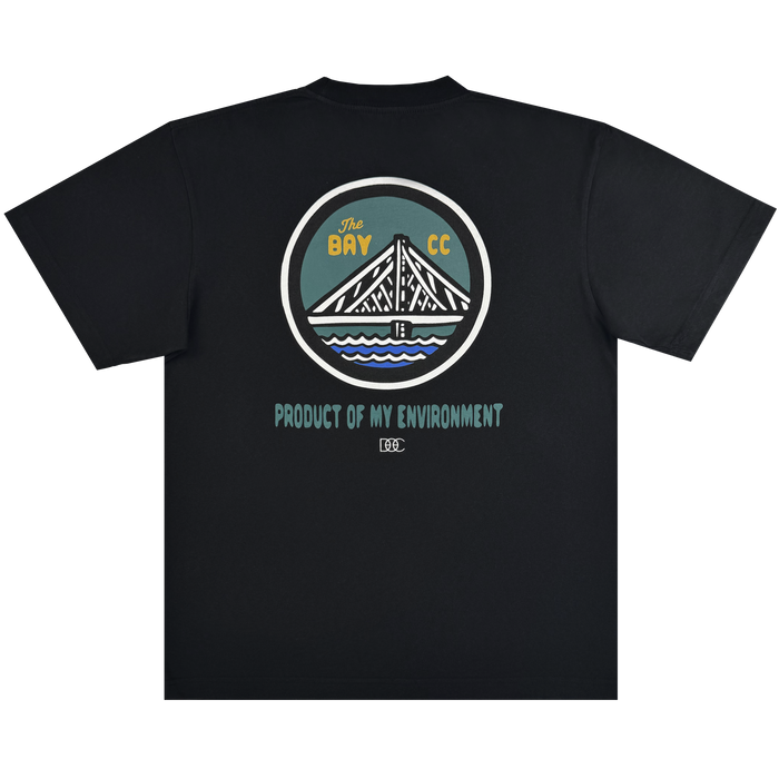 The Oaklandish Bay Area CC Tee By DOC is a black heavyweight cotton t-shirt with a circular back graphic of a bridge, sun, and water. Part of The Bay Collection, it features “The BAY CC” and “PRODUCT OF MY ENVIRONMENT.” Classic fit.