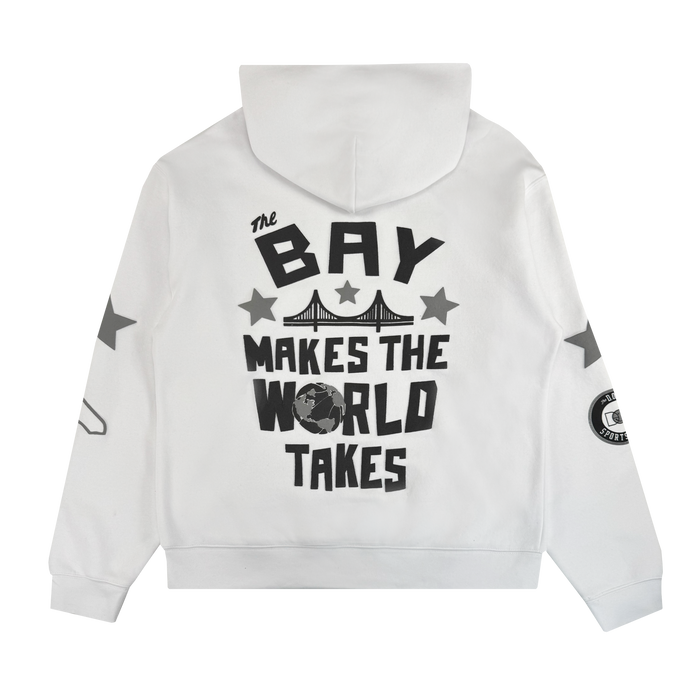 The Bay Bridge Hoodie By DOC V2 from Oaklandish features a white pullover design with a graphic bridge, gray stars, bold “The Bay Makes The World Takes” text, and standout sleeve details for stylish men's fleece hoodie appeal.