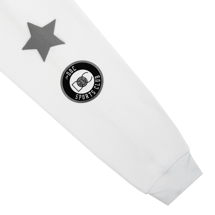 The Bay Bridge Hoodie By DOC V2 by Oaklandish is a white pullover with a large gray star near the shoulder and a black circular patch featuring two boxing gloves and "DOC SPORTS CLUB" in white text.