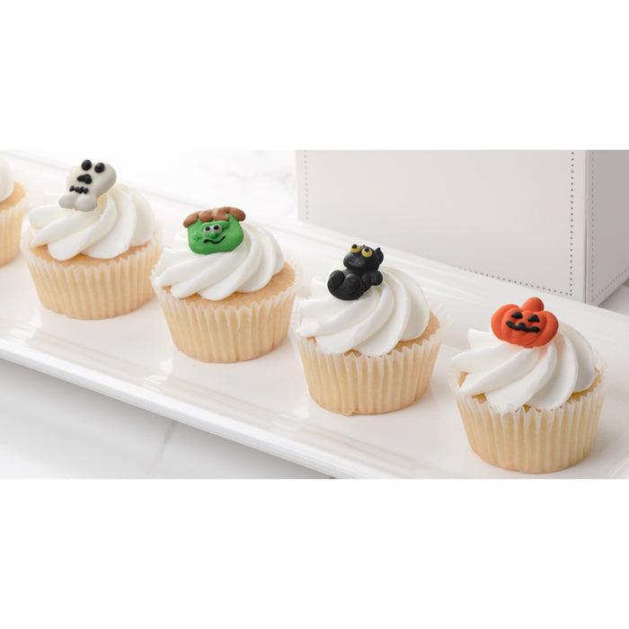 Halloween Royal Icing Toppers for decorating your own cupcakes, chocolates, cookies, cakes, and other desserts. Edible hand piped icing toppers ready to use on your food.