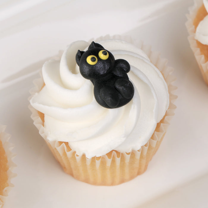 Halloween Royal Icing Toppers for decorating your own cupcakes, chocolates, cookies, cakes, and other desserts. Edible hand piped icing toppers ready to use on your food.
