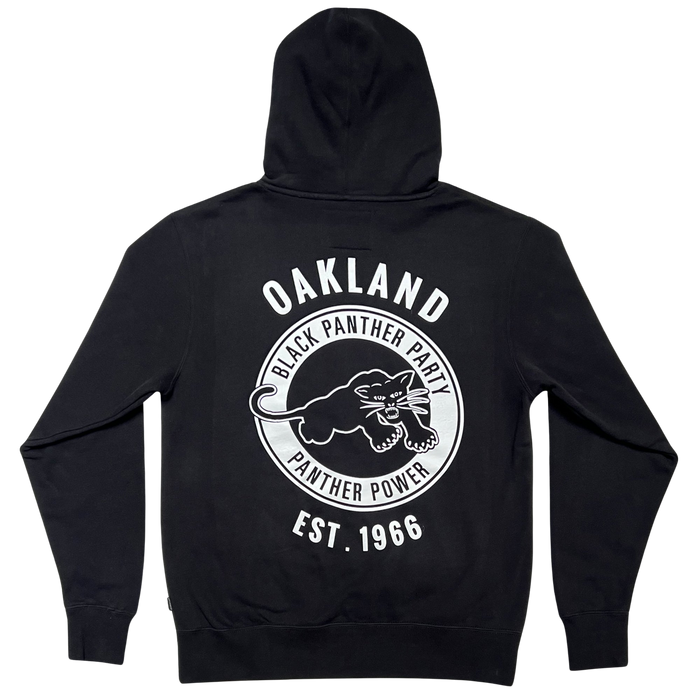 The Black Panther Power Hoodie by Oaklandish is a black pullover hoodie featuring a large crouching black panther design on the back, encircled by the words "Black Panther Party" and "Panther Power." The hoodie also has "Oakland" printed above the panther and "Est. 1966" below. It includes a hood and long sleeves for added comfort.