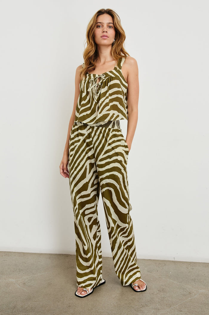 Blythe Crop Tank Top with a Deep Neck with Ties in Selva Colorway, an Olive and White Print - Front Full Body View Featured on Model