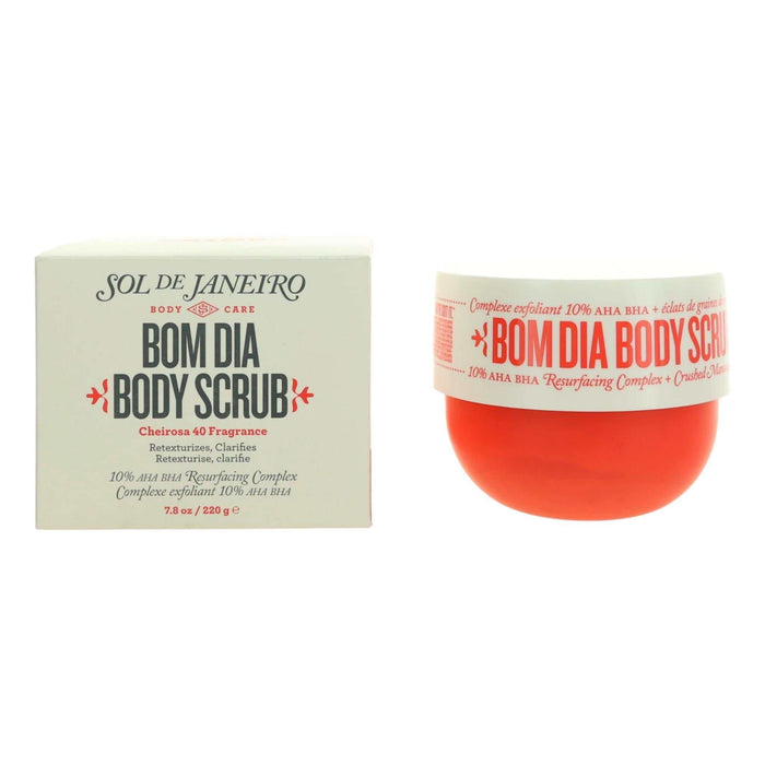 Bom Dia Body Scrub in a coral-red tub with a cream label and matching pale cream product box.