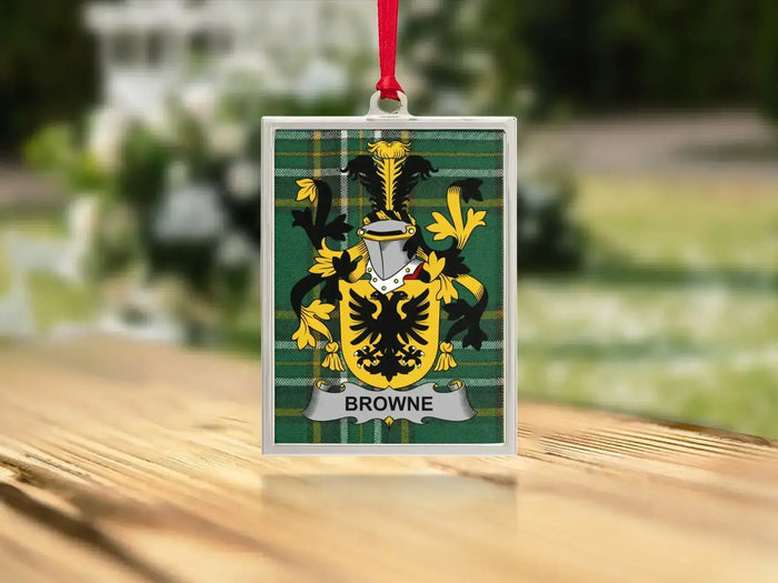 Browne surname crest ornament in a silver-tone portrait frame