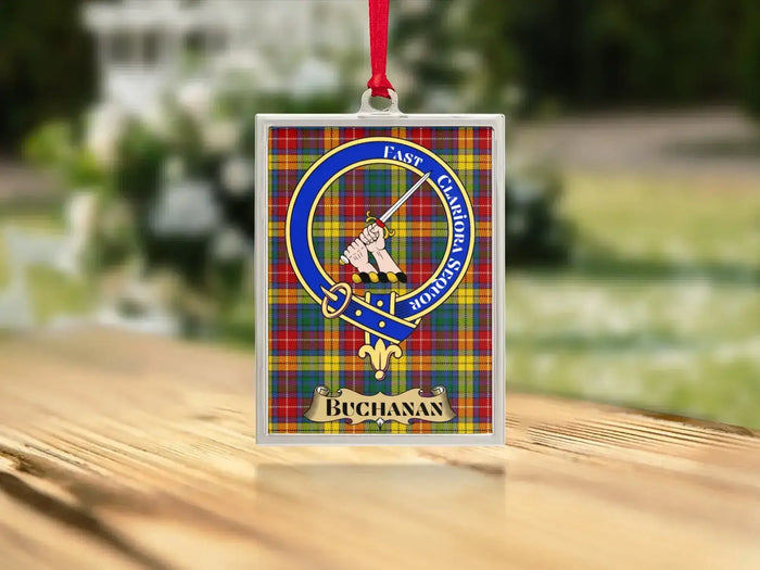 Close-up of the Buchanan family crest on a polished silver-frame metal ornament