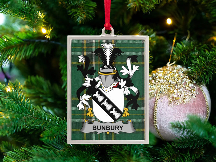 Bunbury Irish family crest Christmas ornament — crest on the Irish national tartan in a silver-tone frame