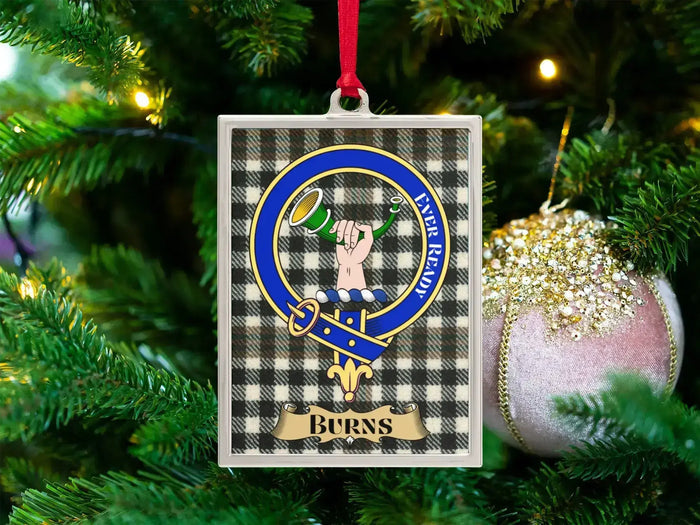 Burns clan crest Christmas ornament in a silver frame on a tartan background