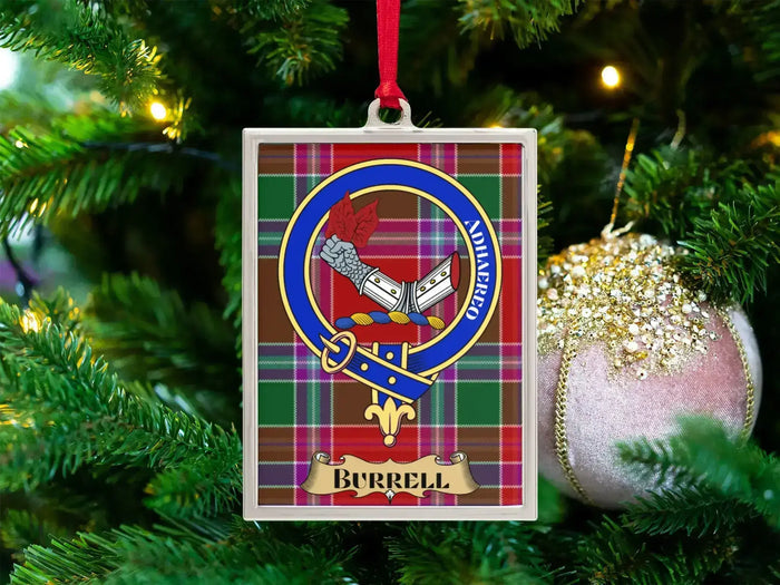 Burrell clan crest Christmas ornament in a silver frame on a tartan background