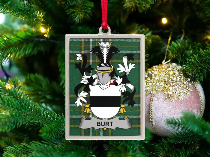 Burt Irish family crest Christmas ornament — crest on the Irish national tartan in a silver-tone frame