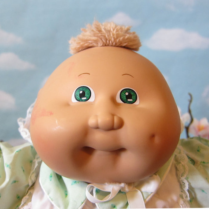 Cabbage Patch Kids Preemie girl doll with light brown hair, green eyes