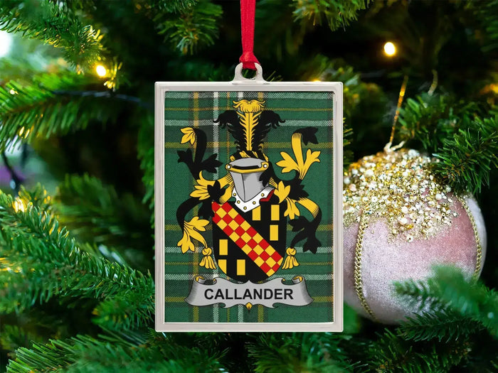 Callander Irish family crest Christmas ornament — crest on the Irish national tartan in a silver-tone frame