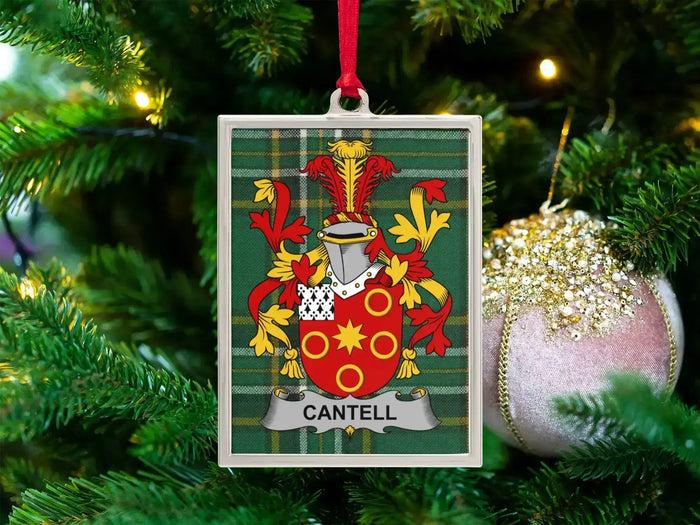 Cantell Irish family crest Christmas ornament — crest on the Irish national tartan in a silver-tone frame