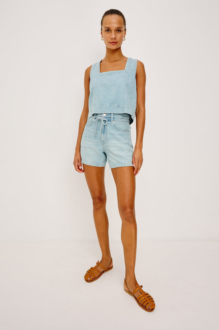 Carbon Crop Tank Top in Cotton Lyocell Denim With Square Neckline, Wide Shoulder Straps, and a Loose, Boxy Fit in Surf Colorway - Full Body Front View Featured on Model