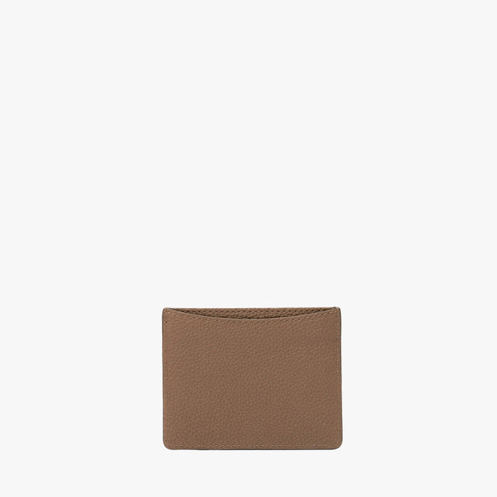 Back panel of STOW London's Cardholder in Mocha pebbled leather on a light grey background