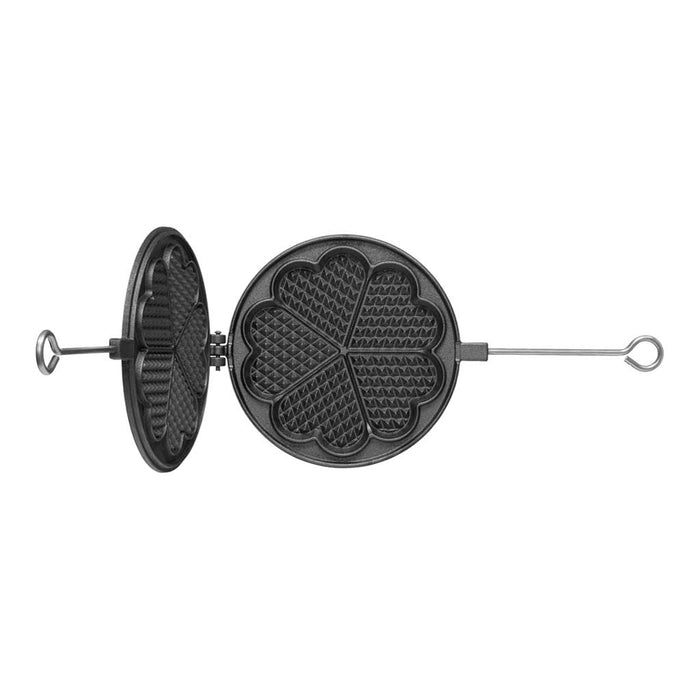 Black cast iron waffle iron open with flower griddle shape and aluminum handle on white background