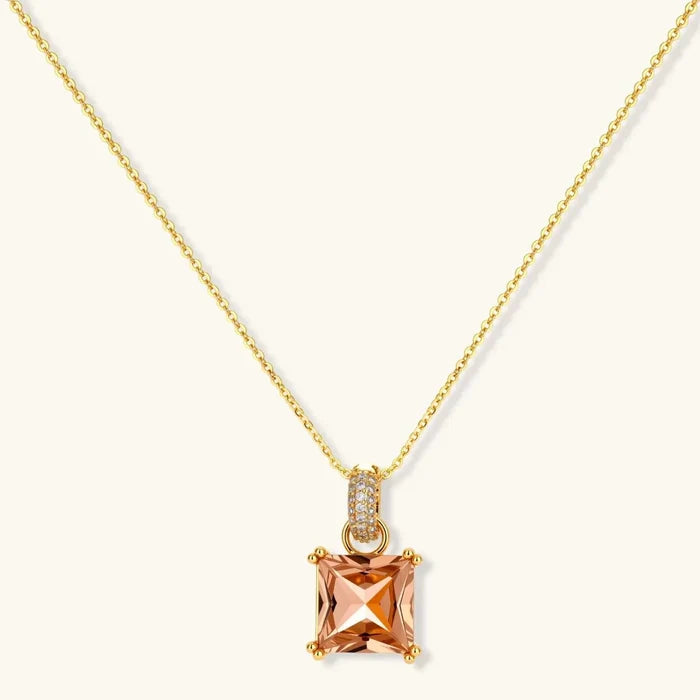 Champagne Zirconia Necklace with a square-cut peach-champagne stone in a gold-tone four-prong setting and pavé bail