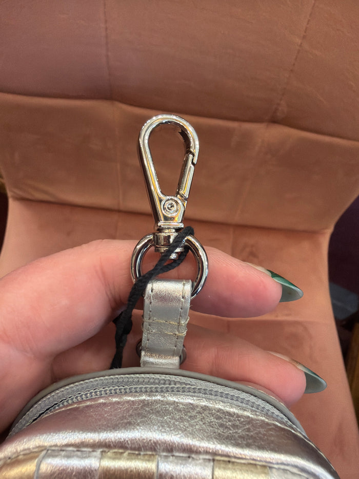Checkerboard pouch charm from ili New York, a stylish bag charm featuring a black and white checkerboard pattern.