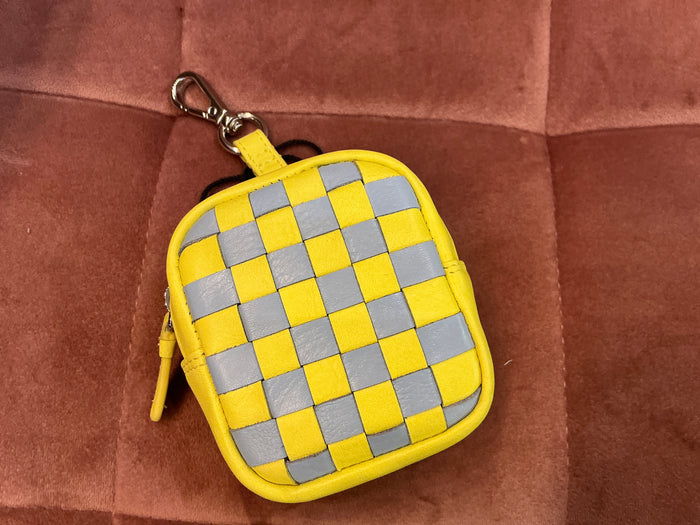 Checkerboard pouch charm by ili New York, a stylish bag charm with black and white checkerboard pattern, attached to a keyring.
