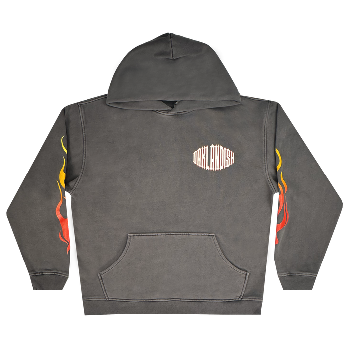 Introducing the Chopper Heavy Hoodie by Other: an oversized, dark gray fleece pullover with drop shoulders, a front pouch pocket, and “OAKLANDISH” printed in white on the left chest. Both sleeves are emblazoned with bold flame designs in red, orange, and yellow. The men’s hoodie is displayed flat against a white background.