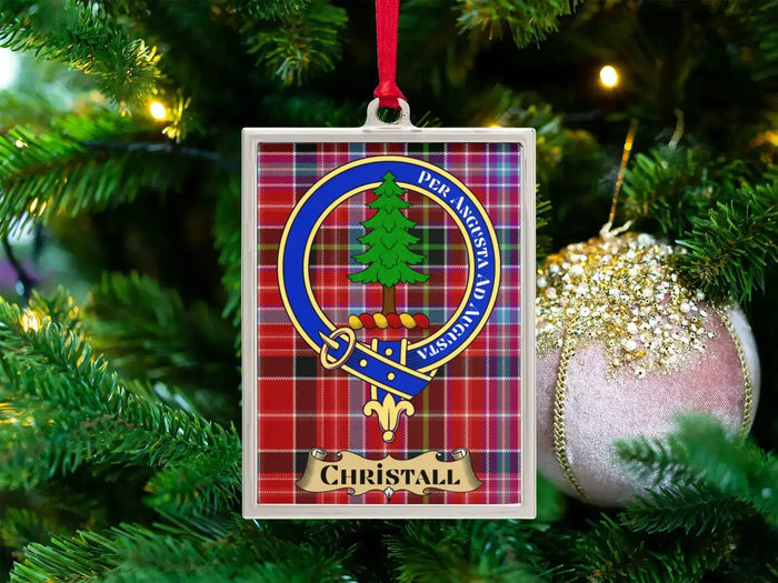 Chrystall clan crest Christmas ornament in a silver frame on a tartan background