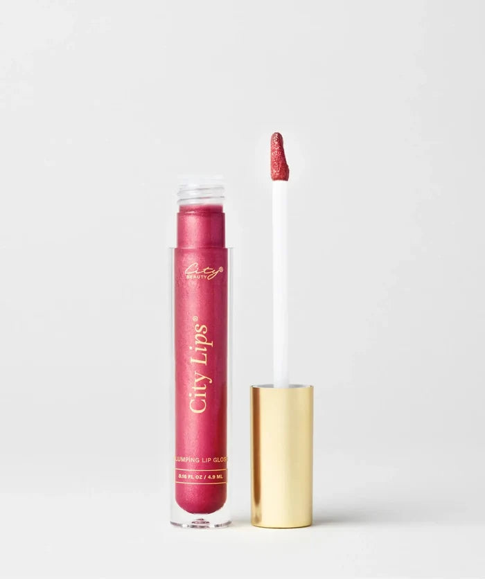 City Lips raspberry lipgloss with shimmery berry finish, glossy and vibrant, featuring a smooth application and reflective shimmer.