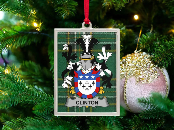 Clinton Irish family crest Christmas ornament — crest on the Irish national tartan in a silver-tone frame