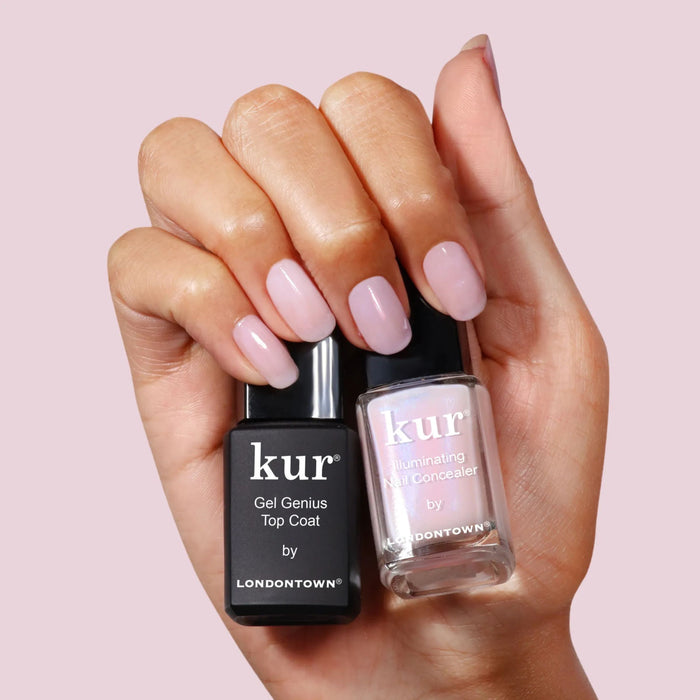 A hand with neatly manicured, pale pink nails holds two LONDONTOWN bottles—one labeled "Gel Genius Top Coat" and the other "Conceal + Go Pink"—for flawless nails every time.